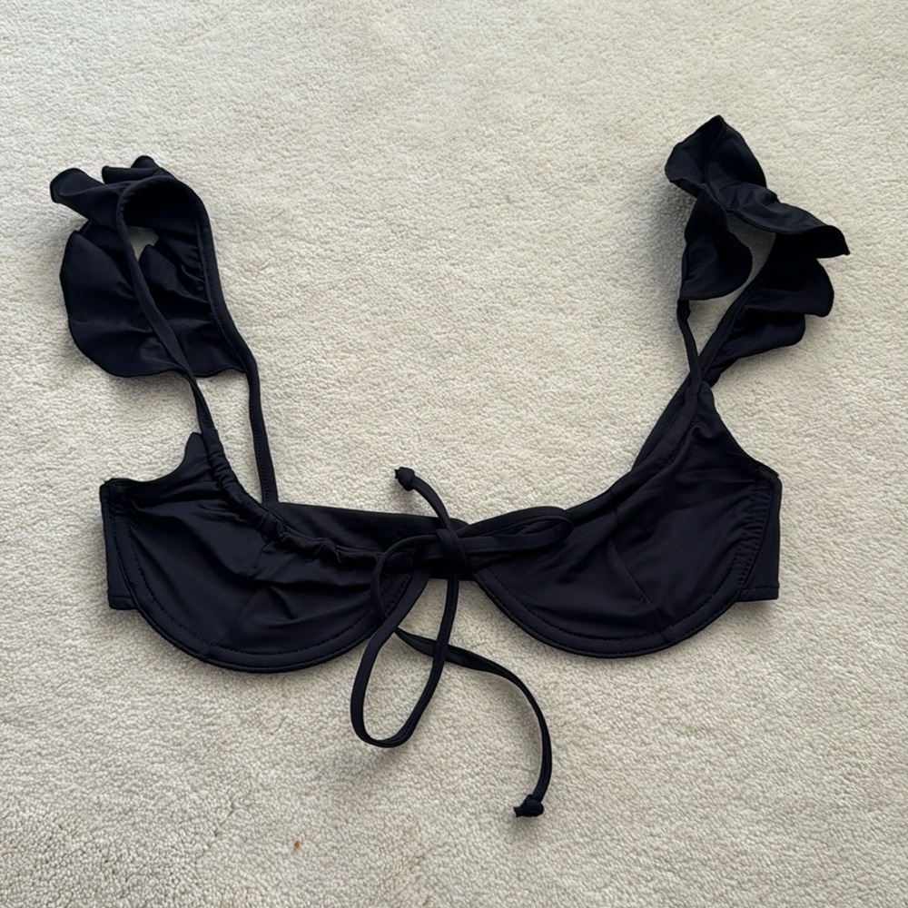 XS bikini top. Black with flutter shoulder straps and underwire. Never worn.